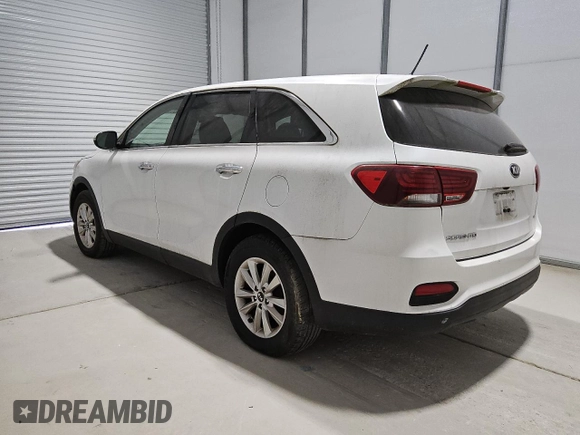 2019 Kia Sorento LX z VIN 5XYPG4A54KG482528, wystawiony jako Copart lot #55098735 z przebiegiem 128 821 mil mil oraz Czysty tytuł • Clean title. Historia ofert i sprzedaży dostępna na DreamBid. Obrazek 2.