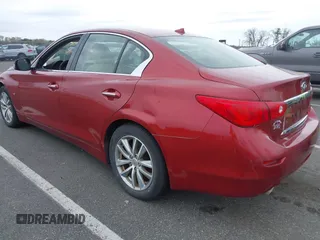 2014 Infiniti Q50 Sport with VIN JN1BV7AR1EM701939, listed as a IAAI auction lot 42051058 with 142,258 mi miles and . Bid and sale history available at DreamBid. Image 3.