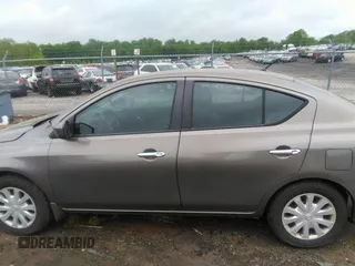 2015 Nissan Versa SV with VIN 3N1CN7AP7FL869485, listed as a IAAI auction lot 42077524 with 198,646 mi miles. Bid and sale history available at carsss.com. Image 14.