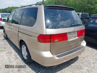 2000 Honda Odyssey EX with VIN 2HKRL1868YH513587, listed as a IAAI auction lot 42092115 with 302,555 mi miles and . Bid and sale history available at DreamBid. Image 3.