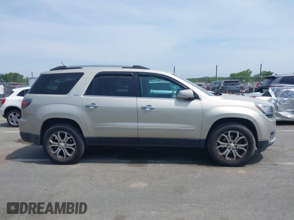 2014 GMC Acadia SLT z VIN 1GKKRRKD0EJ194862, wystawiony jako IAAI lot #42145057 z przebiegiem 164 998 mil mil oraz . Historia ofert i sprzedaży dostępna na DreamBid. Obrazek 13.