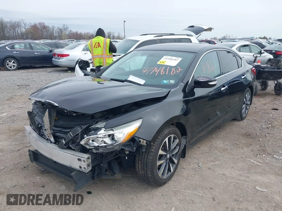 2016 Nissan Altima SR with VIN 1N4AL3AP1GC128738, listed as a IAAI auction lot 41948182 with 156,880 mi miles and . Bid and sale history available at DreamBid. Image 2.