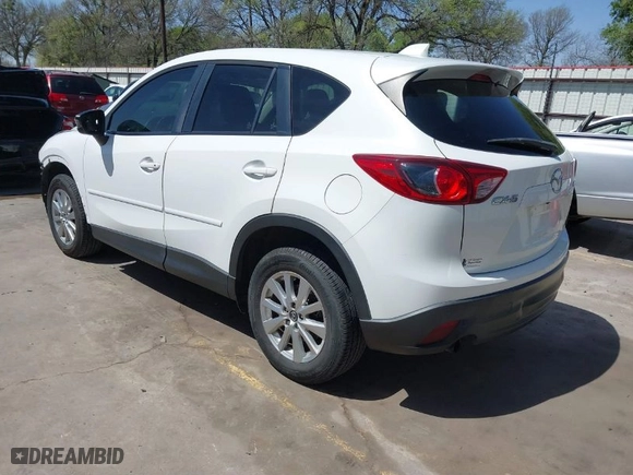 2014 Mazda CX-5 Touring with VIN JM3KE2CY2E0426164, listed as a IAAI auction lot 41812932 with 186,015 mi miles. Bid and sale history available at carsss.com. Image 3.