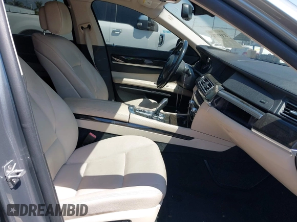 2012 BMW 7 Series 740Li with VIN WBAKB4C50CC576429, listed as a IAAI auction lot 42153378 with 161,168 mi miles and . Bid and sale history available at DreamBid. Image 5.