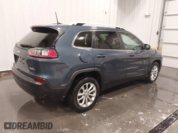 2019 Jeep Cherokee Latitude with VIN 1C4PJLCB0KD434554, listed as a IAAI auction lot 41615783 with 73,014 mi miles. Bid and sale history available at carsss.com. Image 4.