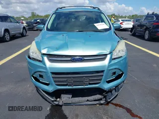 2013 Ford Escape SE with VIN 1FMCU9GX0DUC75662, listed as a IAAI auction lot 42549360 with 156,666 mi miles and . Bid and sale history available at DreamBid. Image 12.