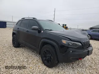 2021 Jeep Cherokee Trailhawk with VIN 1C4PJMBX5MD123854, listed as a Copart auction lot 45891165 with 98,964 mi miles and Salvage title. Bid and sale history available at DreamBid. Image 4.