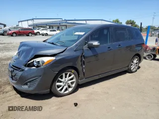 2015 Mazda 5 Touring with VIN JM1CW2CL2F0188459, listed as a Copart auction lot 67553274 with 185,581 mi miles and Salvage Title. Bid and sale history available at DreamBid. Image 1.