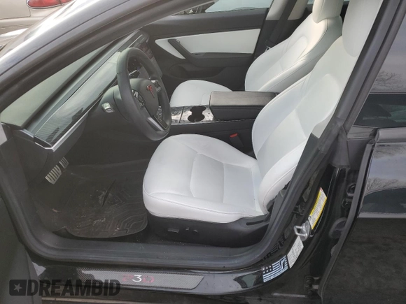 2019 Tesla Model 3 Long Range with VIN 5YJ3E1EB9KF440365, listed as a Copart auction lot 83839034 with 74,667 mi miles and Salvage Title. Bid and sale history available at DreamBid. Image 7.