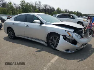 2014 Nissan Maxima SV with VIN 1N4AA5AP7EC478132, listed as a Copart auction lot 59369565 with 130,569 mi miles and Salvage title. Bid and sale history available at DreamBid. Image 4.