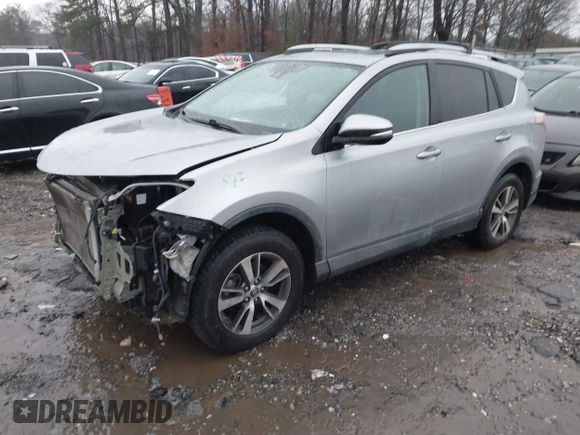 2018 Toyota RAV4 XLE with VIN 2T3RFREV2JW717351, listed as a IAAI auction lot 41576522 with 147,116 mi miles. Bid and sale history available at carsss.com. Image 17.