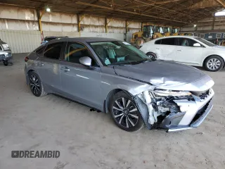 2023 Honda Civic EX-L z VIN 19XFL1H77PE004072, wystawiony jako Copart lot #49524855 z przebiegiem 21 100 mil mil oraz Szkoda całkowita • Salvage title. Historia ofert i sprzedaży dostępna na DreamBid. Obrazek 4.