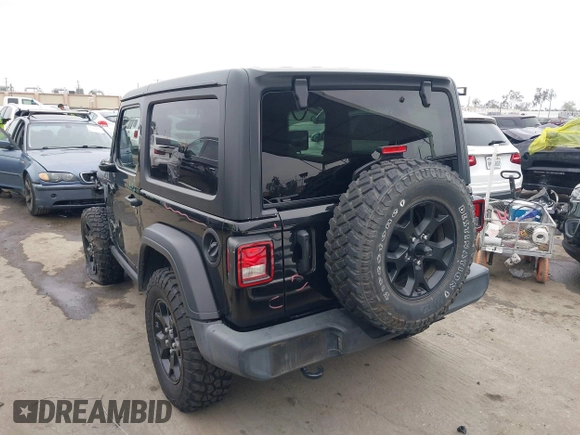 2021 Jeep Wrangler Sport with VIN 1C4GJXAN5MW627228, listed as a IAAI auction lot 42170010 with 56,965 mi miles and . Bid and sale history available at DreamBid. Image 3.
