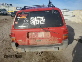 1998 Jeep Grand Cherokee Laredo with VIN 1J4GZ58S7WC105854, listed as a Copart auction lot 82321254 with 178,072 mi miles and Salvage Title. Bid and sale history available at carsss.com. Image 6.