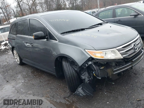 2012 Honda Odyssey Touring with VIN 5FNRL5H98CB089871, listed as a IAAI auction lot 41351447 with 999,999 mi miles. Bid and sale history available at carsss.com. Image 1.