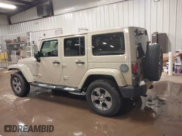2018 Jeep Wrangler JK Unlimited Sahara with VIN 1C4HJWEG4JL803516, listed as a IAAI auction lot 41127652 with 85,749 mi miles. Bid and sale history available at carsss.com. Image 15.