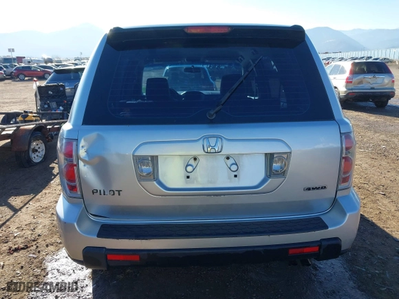 2006 Honda Pilot LX with VIN 2HKYF18156H556689, listed as a IAAI auction lot 40792236 with 273,856 mi miles. Bid and sale history available at carsss.com. Image 17.
