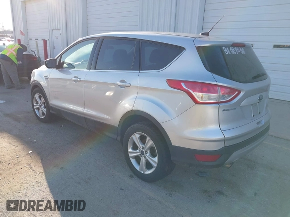 2016 Ford Escape SE with VIN 1FMCU9GX0GUA13421, listed as a IAAI auction lot 41788760 with 123,062 mi miles and . Bid and sale history available at DreamBid. Image 3.