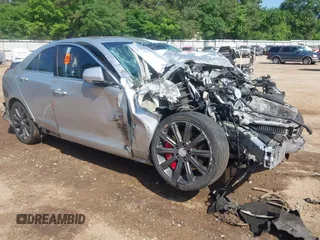 2015 Cadillac ATS Performance RWD z VIN 1G6AC5SX2F0138055, wystawiony jako IAAI lot #42090591 z przebiegiem Nie podano mil oraz . Historia ofert i sprzedaży dostępna na DreamBid. Obrazek 1.