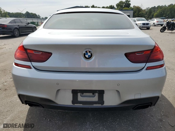 2015 BMW 6 Series 650i with VIN WBA6B2C58FGB99581, listed as a Copart auction lot 71403354 with 89,545 mi miles and Salvage Title. Bid and sale history available at carsss.com. Image 6.