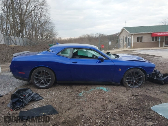 2021 Dodge Challenger R/T Scat Pack Widebody z VIN 2C3CDZFJXMH615361, wystawiony jako IAAI lot #41911374 z przebiegiem 27 159 mil mil oraz . Historia ofert i sprzedaży dostępna na DreamBid. Obrazek 14.