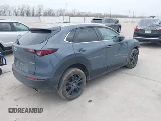 2023 Mazda CX-30 S Carbon Edition with VIN 3MVDMBCM0PM532449, listed as a IAAI auction lot 41799255 with 60,604 mi miles and . Bid and sale history available at DreamBid. Image 4.