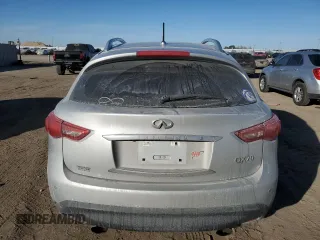 2015 Infiniti QX70 z VIN JN8CS1MW6FM483141, wystawiony jako Copart lot #44126235 z przebiegiem 174 034 mil mil oraz Czysty tytuł • Clean title. Historia ofert i sprzedaży dostępna na DreamBid. Obrazek 6.