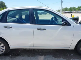 2007 Ford Focus S with VIN 1FAFP34N17W124403, listed as a IAAI auction lot 42021135 with 178,896 mi miles and . Bid and sale history available at carsss.com. Image 14.