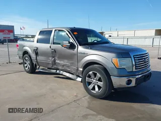 2011 Ford F-150 XL with VIN 1FTFW1CF2BFA56388, listed as a IAAI auction lot 41025261 with 300,741 mi miles. Bid and sale history available at carsss.com. Image 1.