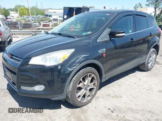 2013 Ford Escape SEL with VIN 1FMCU9H97DUA51529, listed as a IAAI auction lot 42164245 with 106,649 mi miles and . Bid and sale history available at DreamBid. Image 6.