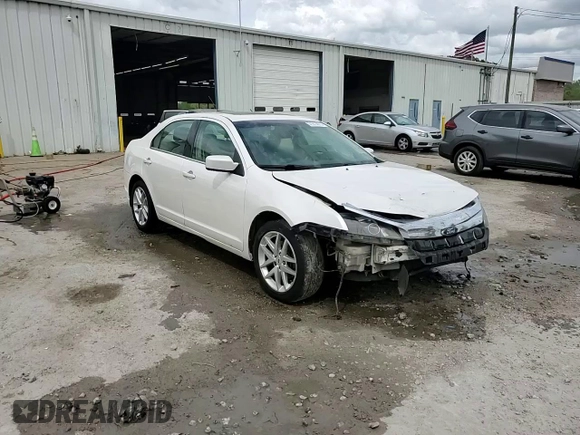 2012 Ford Fusion SEL z VIN 3FAHP0JA3CR184074, wystawiony jako Copart lot #51973675 z przebiegiem 192 732 mil mil oraz Szkoda całkowita • Salvage title. Historia ofert i sprzedaży dostępna na DreamBid. Obrazek 14.