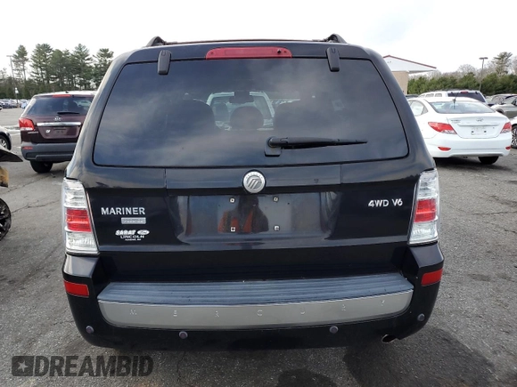 2008 Mercury Mariner Premier z VIN 4M2CU97168KJ31769, wystawiony jako Copart lot #50248325 z przebiegiem 133 450 mil mil oraz Szkody całkowita. Historia ofert i sprzedaży dostępna na DreamBid. Obrazek 6.