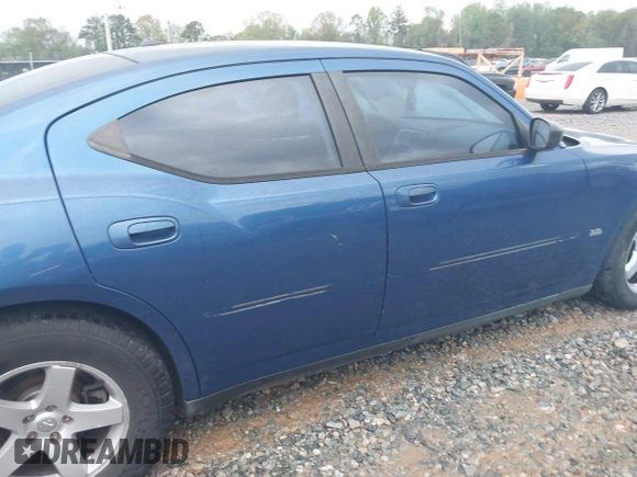 2009 Dodge Charger SXT with VIN 2B3KA33V39H585083, listed as a IAAI auction lot 41911176 with 134,600 mi miles and . Bid and sale history available at carsss.com. Image 14.