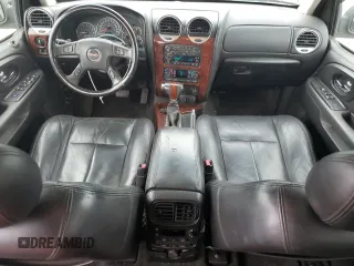 2005 GMC Envoy SLT with VIN 1GKDS13S652330496, listed as a Copart auction lot 73317234 with 191,138 mi miles and Salvage Title. Bid and sale history available at carsss.com. Image 8.