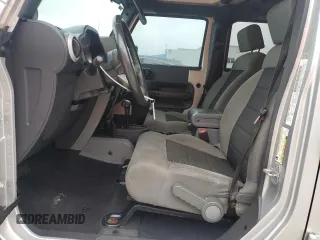 2010 Jeep Wrangler Unlimited Sahara with VIN 1J4BA5H17AL117410, listed as a Copart auction lot 88519555 with 126,471 mi miles and Salvage Title. Bid and sale history available at carsss.com. Image 7.