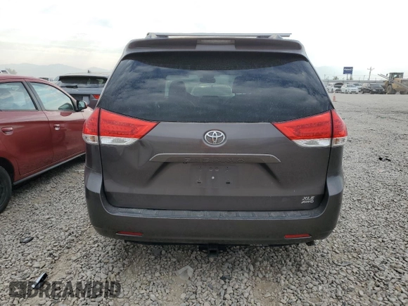2012 Toyota Sienna XLE with VIN 5TDDK3DC7CS039221, listed as a Copart auction lot 64188804 with 180,811 mi miles and Salvage Title. Bid and sale history available at carsss.com. Image 6.