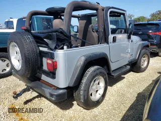 2004 Jeep Wrangler Sport with VIN 1J4FA49SX4P776775, listed as a Copart auction lot 74946824 with Not Provided miles and Salvage Title. Bid and sale history available at carsss.com. Image 3.