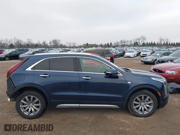 2021 Cadillac XT4 FWD Premium Luxury with VIN 1GYFZCR41MF041306, listed as a IAAI auction lot 41143747 with 53,116 mi miles. Bid and sale history available at carsss.com. Image 13.