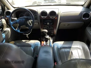 2003 GMC Envoy SLT with VIN 1GKDT13S132171350, listed as a Copart auction lot 67076744 with 286,512 mi miles and Salvage Title. Bid and sale history available at carsss.com. Image 8.