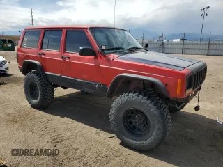 1999 Jeep Cherokee Sport with VIN 1J4FF68S6XL574980, listed as a Copart auction lot 51639635 with 257,854 mi miles and Salvage Title. Bid and sale history available at carsss.com. Image 4.