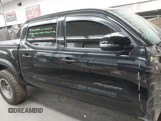 2021 Toyota Tacoma SR with VIN 3TMCZ5AN4MM448304, listed as a IAAI auction lot 42046932 with 56,161 mi miles and . Bid and sale history available at DreamBid. Image 13.