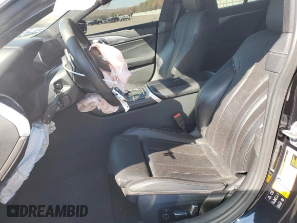 2020 BMW 8 Series M850i with VIN WBAGV8C02LCE34594, listed as a Copart auction lot 50389675 with 37,279 mi miles and Salvage title. Bid and sale history available at DreamBid. Image 7.