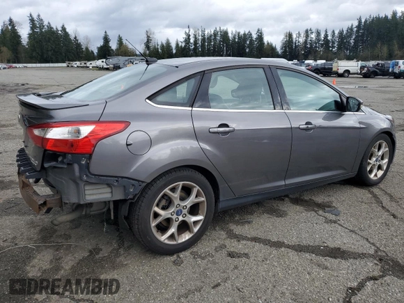2013 Ford Focus Titanium with VIN 1FADP3J23DL209175, listed as a Copart auction lot 51594075 with 92,531 mi miles and Salvage Title. Bid and sale history available at carsss.com. Image 3.