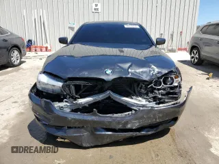 2018 BMW 5 Series 530i xDrive z VIN WBAJA7C50JG909279, wystawiony jako Copart lot #56416235 z przebiegiem Nie podano mil oraz Nie do naprawy • Non repairable. Historia ofert i sprzedaży dostępna na DreamBid. Obrazek 5.
