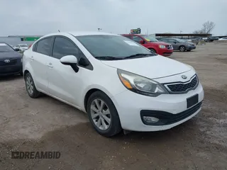 2014 Kia Rio EX with VIN KNADN4A3XE6342415, listed as a IAAI auction lot 41592320 with 134,383 mi miles. Bid and sale history available at carsss.com. Image 1.