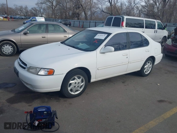 1999 Nissan Altima XE with VIN 1N4DL01DXXC189667, listed as a IAAI auction lot 41715276 with 132,425 mi miles. Bid and sale history available at carsss.com. Image 2.