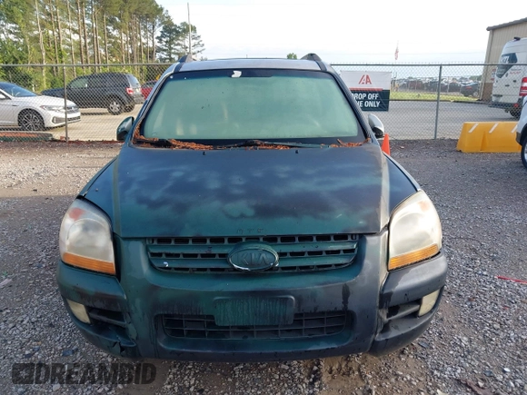 2006 Kia Sportage LX with VIN KNDJF723467183437, listed as a IAAI auction lot 42193429 with 186,114 mi miles and . Bid and sale history available at carsss.com. Image 6.