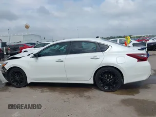 2018 Nissan Altima SR with VIN 1N4AL3AP3JC290863, listed as a IAAI auction lot 41933628 with 121,771 mi miles and . Bid and sale history available at carsss.com. Image 14.