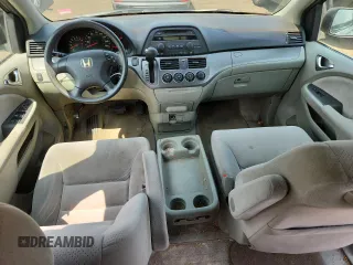 2007 Honda Odyssey LX z VIN 5FNRL38257B011710, wystawiony jako Copart lot #61163265 z przebiegiem 196 575 mil mil oraz Czysty tytuł • Clean title. Historia ofert i sprzedaży dostępna na DreamBid. Obrazek 8.