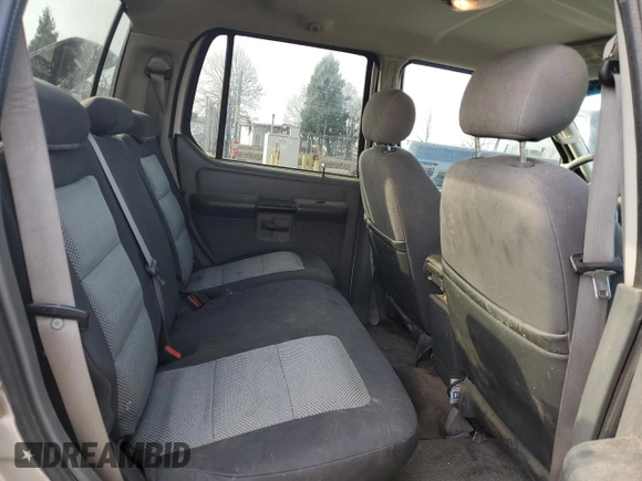 2005 Ford Explorer Sport Trac XLS z VIN 1FMZU77K75UB40439, wystawiony jako Copart lot #88530195 z przebiegiem 181 383 mil mil oraz Szkoda całkowita • Salvage title. Historia ofert i sprzedaży dostępna na DreamBid. Obrazek 10.